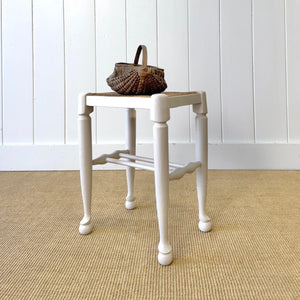 A Painted Stool with Rush Seat and Spoon Feet