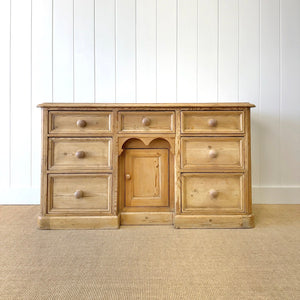 An English Country 7 Drawer Pine Buffet or Sideboard