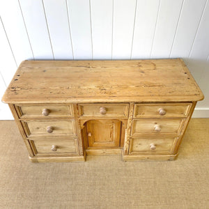 An English Country 7 Drawer Pine Buffet or Sideboard