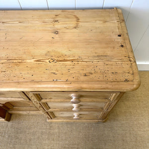An English Country 7 Drawer Pine Buffet or Sideboard