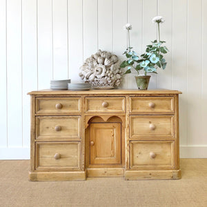 An English Country 7 Drawer Pine Buffet or Sideboard