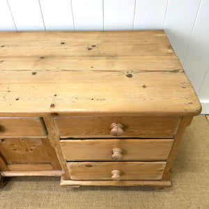 An English Country 7 Drawer Pine Buffet or Sideboard