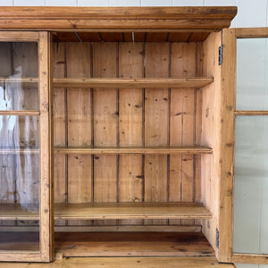 A 19th Century English Pine Bookcase Cabinet or Hutch with Glazed Doors