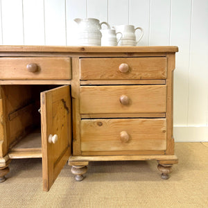An English Country 7 Drawer Pine Buffet or Sideboard