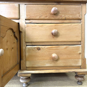 An English Country 7 Drawer Pine Buffet or Sideboard