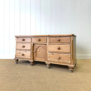 An English Country 7 Drawer Pine Buffet or Sideboard