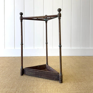 A 19th Century English Brass Umbrella or Stick Stand with Iron Underplate c1890