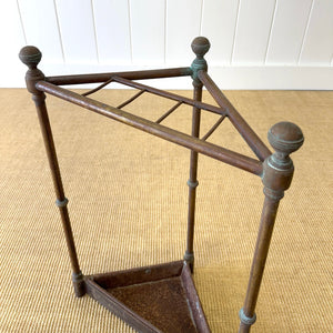 A 19th Century English Brass Umbrella or Stick Stand with Iron Underplate c1890