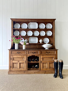An Early 19th century Rustic Pine Welsh Dresser or Cupboard with Brass Hardware