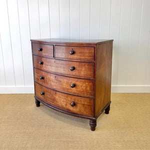 A Large Antique English Bow Front Mahogany Chest of Drawers