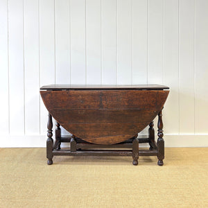 A Very Good Antique English Country Oak Drop Leaf Gate Leg Table with Drawer