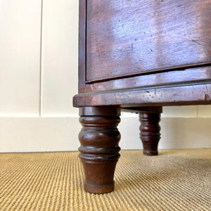A Large Antique English Bow Front Mahogany Chest of Drawers