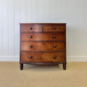A Large Antique English Bow Front Mahogany Chest of Drawers