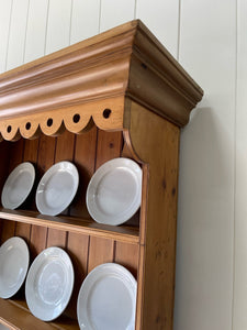 A 19th Century Pine Welsh Dresser or Cupboard with Wood and Brass Hardware
