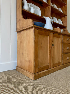 A 19th Century Pine Welsh Dresser or Cupboard with Wood and Brass Hardware