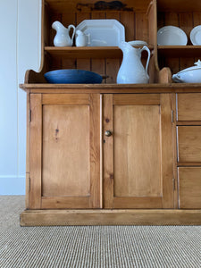 A 19th Century Pine Welsh Dresser or Cupboard with Wood and Brass Hardware