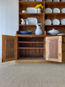 A 19th Century Pine Welsh Dresser or Cupboard with Wood and Brass Hardware