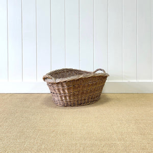 A Vintage Wicker Linen Basket