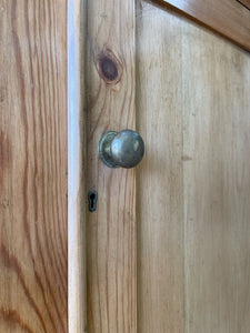 A 19th Century Pine Welsh Dresser or Cupboard with Wood and Brass Hardware