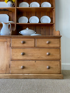 A 19th Century Pine Welsh Dresser or Cupboard with Wood and Brass Hardware