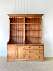 A 19th Century Pine Welsh Dresser or Cupboard with Wood and Brass Hardware