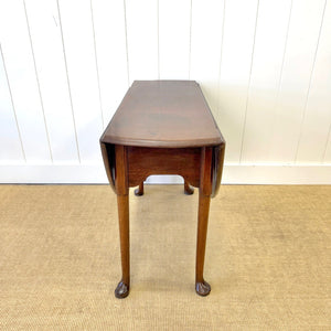 An Antique 18th Century Drop Leaf Dining Table with Pad Feet
