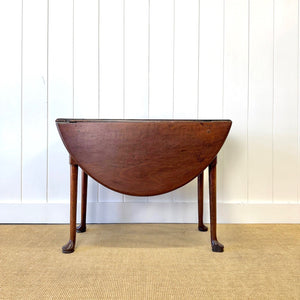 An Antique 18th Century Drop Leaf Dining Table with Pad Feet