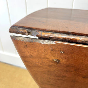 An Antique 18th Century Drop Leaf Dining Table with Pad Feet