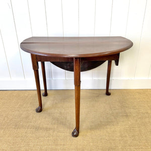An Antique 18th Century Drop Leaf Dining Table with Pad Feet