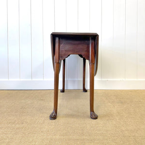 An Antique 18th Century Drop Leaf Dining Table with Pad Feet
