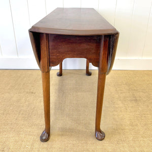 An Antique 18th Century Drop Leaf Dining Table with Pad Feet