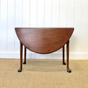 An Antique 18th Century Drop Leaf Dining Table with Pad Feet