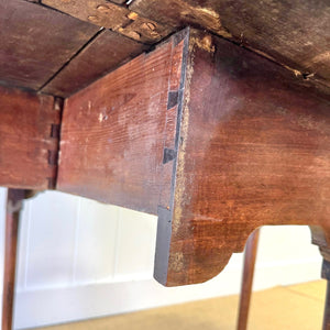 An Antique 18th Century Drop Leaf Dining Table with Pad Feet