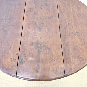 An Antique 18th Century Drop Leaf Dining Table with Pad Feet