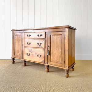 An English Country 7 Drawer Pine Buffet or Sideboard