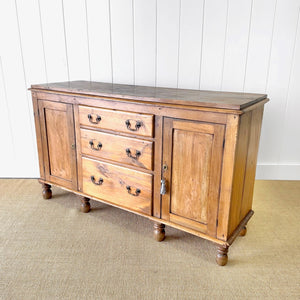 An English Country 7 Drawer Pine Buffet or Sideboard