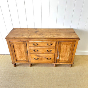 An English Country 7 Drawer Pine Buffet or Sideboard