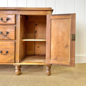 An English Country 7 Drawer Pine Buffet or Sideboard