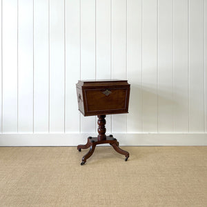 A Georgian Mahogany Cellarette Table with Rising Lid
