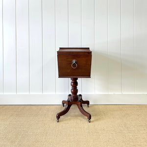 A Georgian Mahogany Cellarette Table with Rising Lid