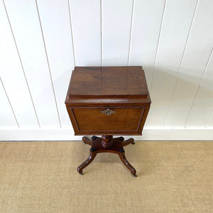 A Georgian Mahogany Cellarette Table with Rising Lid
