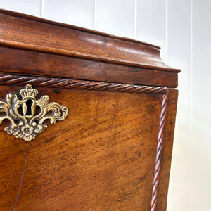 A Georgian Mahogany Cellarette Table with Rising Lid