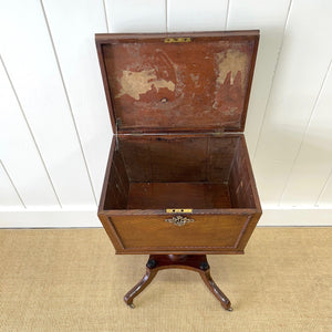 A Georgian Mahogany Cellarette Table with Rising Lid