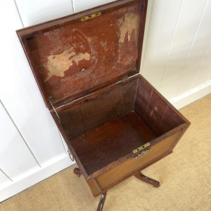 A Georgian Mahogany Cellarette Table with Rising Lid