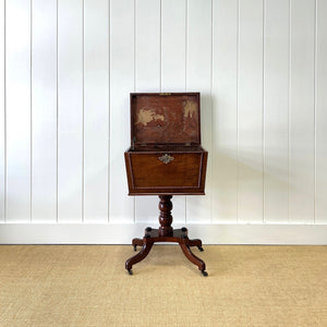 A Georgian Mahogany Cellarette Table with Rising Lid