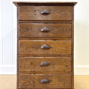 An Antique Pine Set or Bank of Drawers