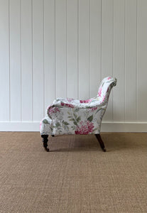 An Antique English Oak Floral Lounge Chair