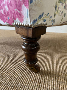 An Antique English Oak Floral Lounge Chair