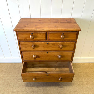 A 19th Century English Pine Chest of Drawers/Dresser with Tulip Feet