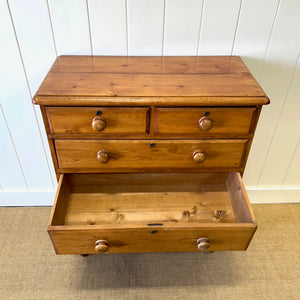A 19th Century English Pine Chest of Drawers/Dresser with Tulip Feet